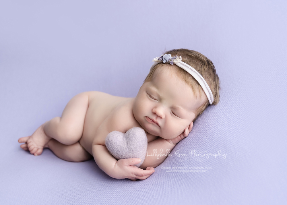 newborn picture with Purple Heart