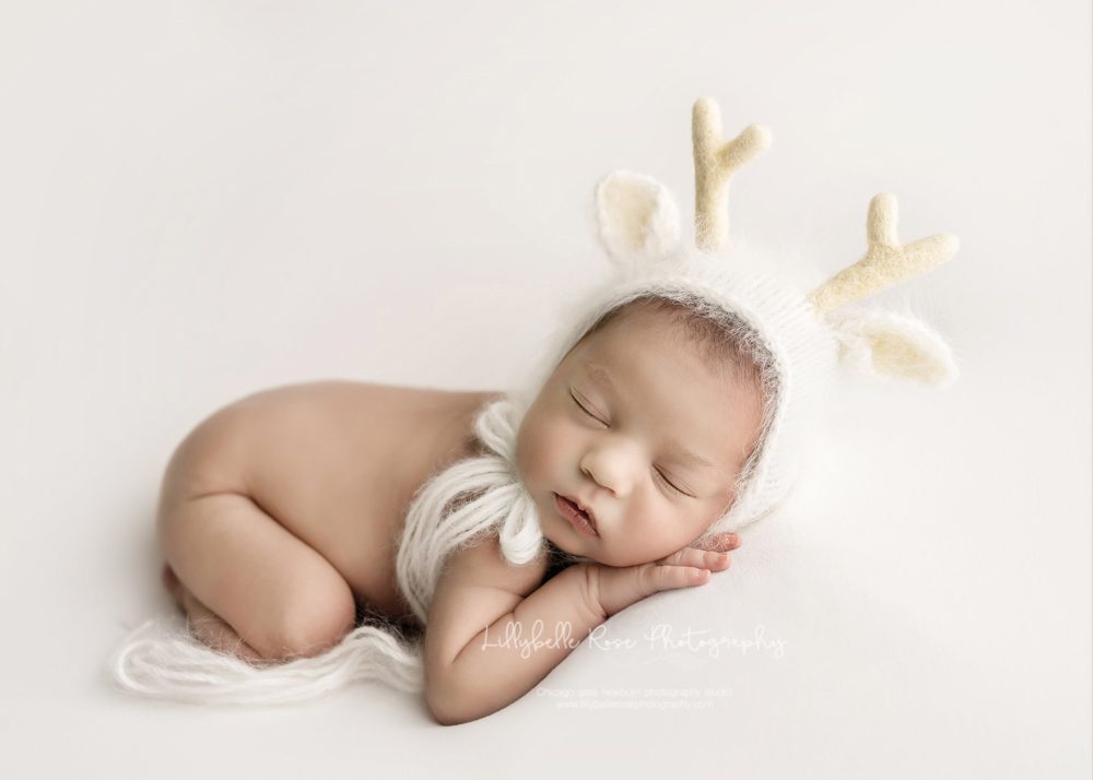 newborn in holiday bonnet