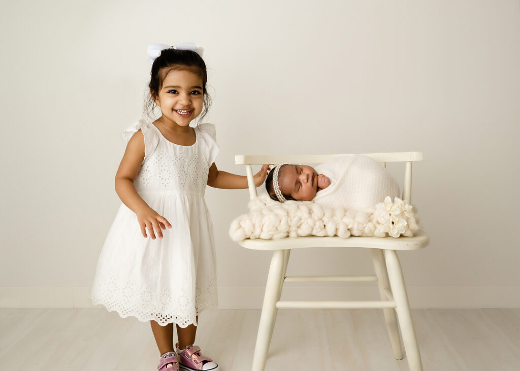 baby-proof-your-home, happy sibling newborn portraits 