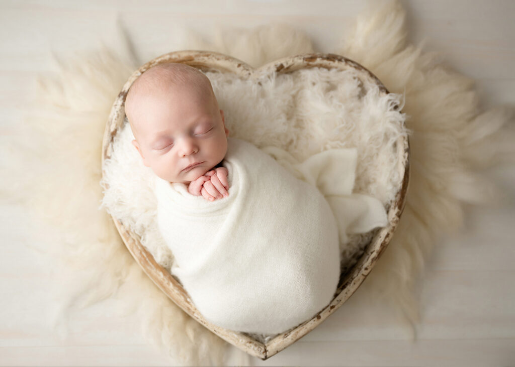 Elmhurst Newborn Photoshoot, beautiful baby in delicate heart prop