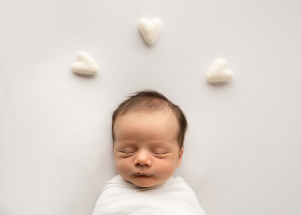 newborn swaddles and pictures, prenatal-genetic-testing