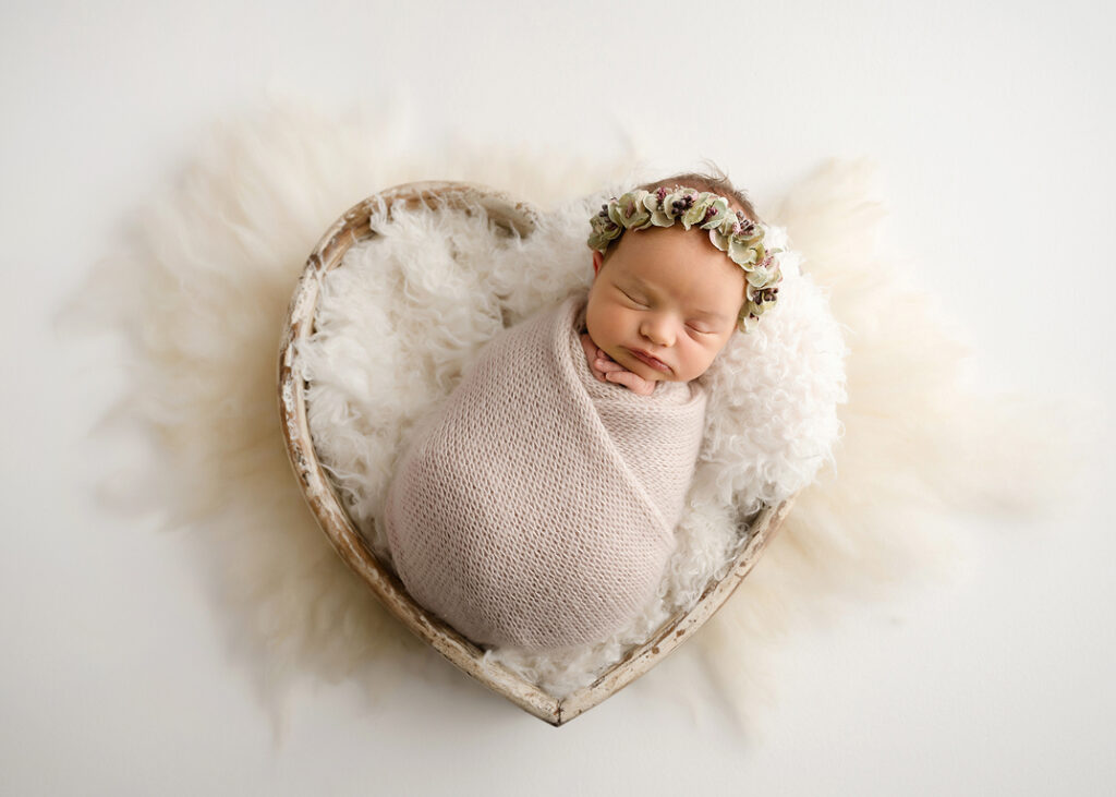 newborn in heart prop at Wheaton Newborn Photographer Session