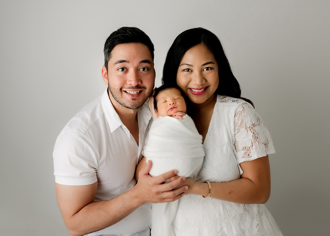 Parents and newborn portrait